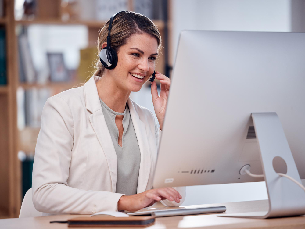 Woman completing professional telemarketing services in Guildford.